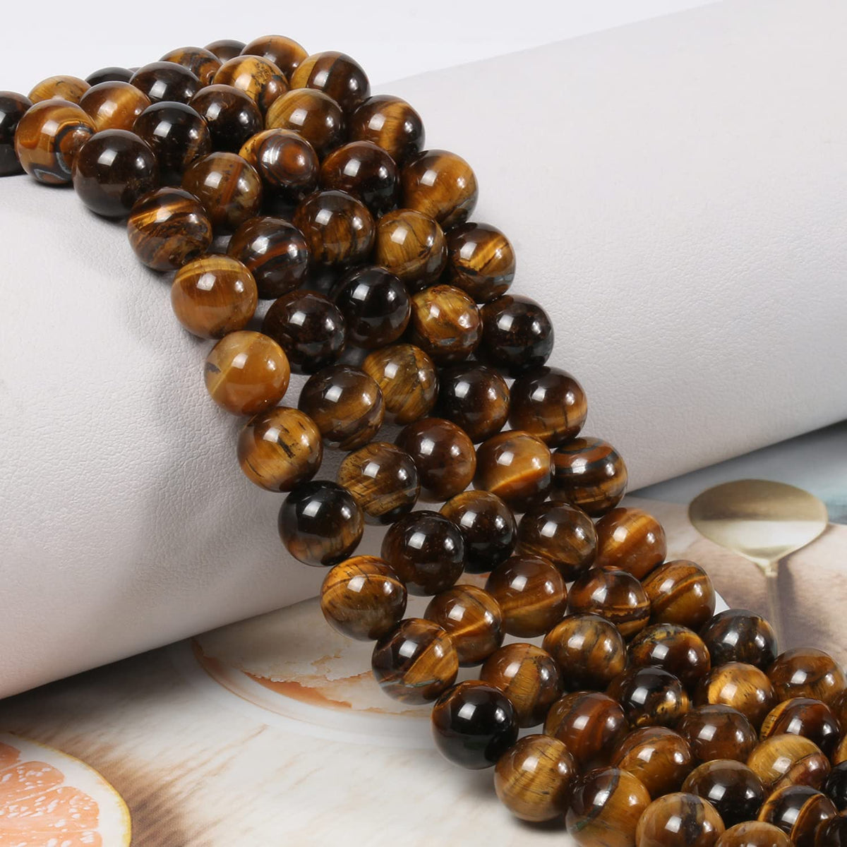 NITOPUPU 100Pcs 10mm Natural Smooth Yellow Tiger Eye Gemstone Beads Round Loose Stone Beads for Jewerly Making with Crystal Stretch Cord