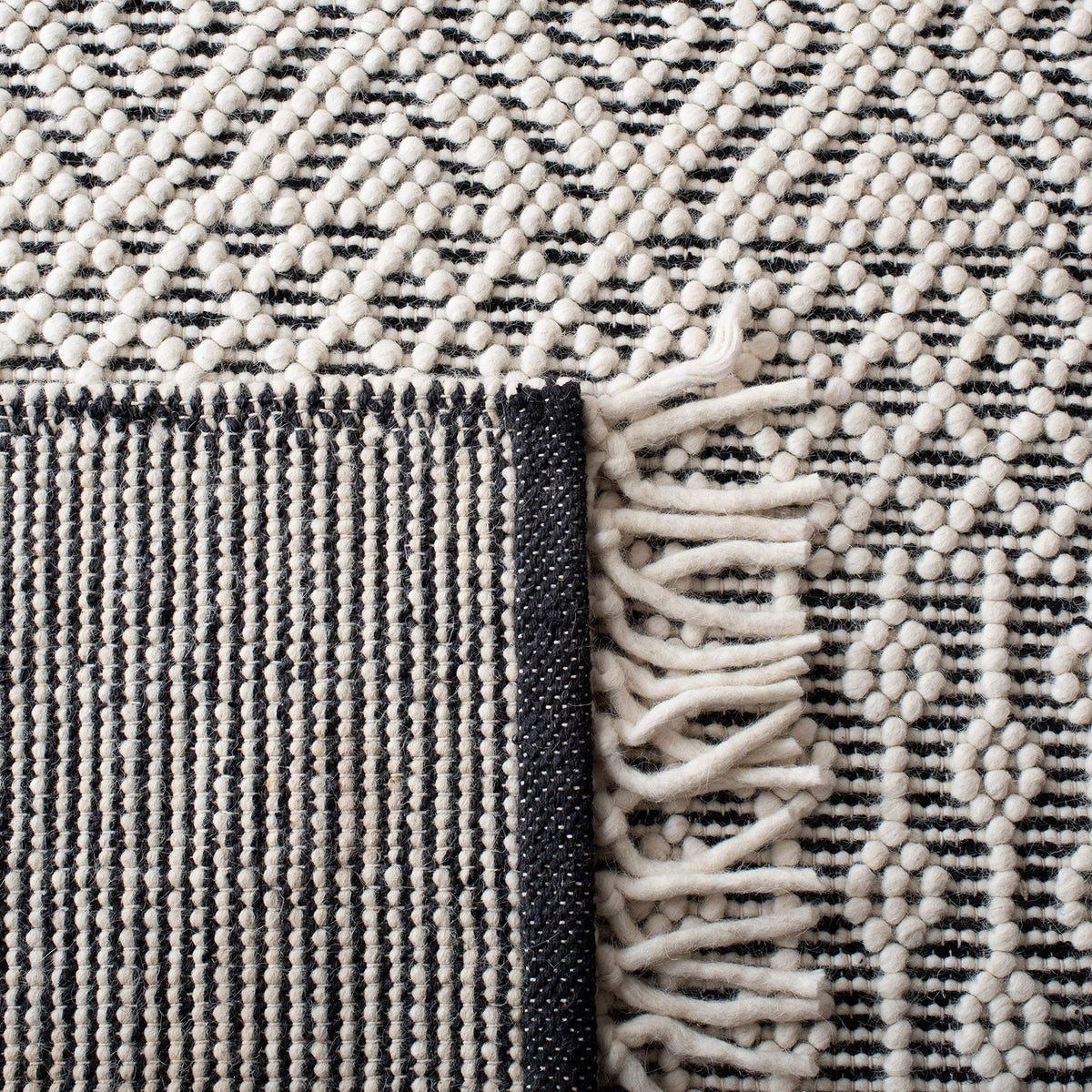 SAFAVIEH Natura Collection Area Rug - 9' x 12', Ivory & Black, Handmade Moroccan Boho Wool Fringe, Ideal for High Traffic Areas in Living Room, Bedroom (NAT852Z)