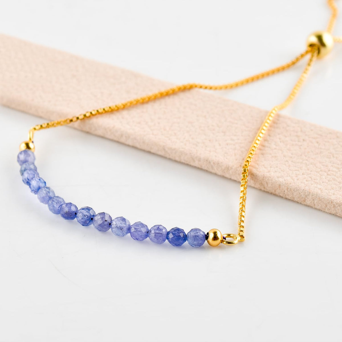 InfinityGemsArt Tanzanite Bracelets For Women, December Birthstone, Blue Beaded Stone Bolo Slider Crystals Gemstones Boho Jewelry, 14K Gold Plated Adjustable Chain, Valentines Day Gifts For Her