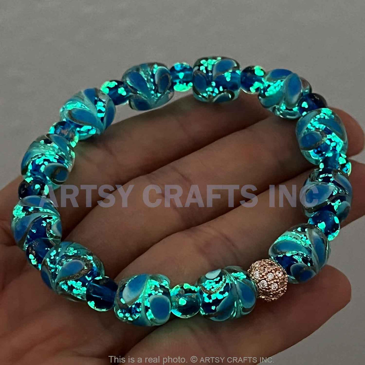 ARTSY CRAFTS INC Peacock Feather Glow in the Dark Firefly Bead Bracelet, Luminous Murano Jewelry Glowing Beaded Bracelet, Stretchy Wristband, Sapphire 6-7"