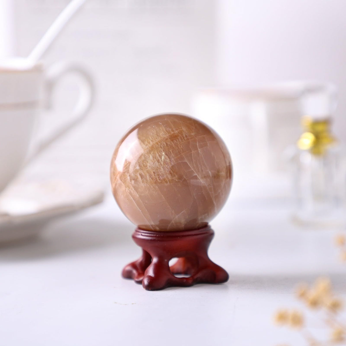 TUMBEELLUWA Orange Moonstone Crystal Ball with Stand for Fortune Teller Witchcraft Divination, Decorative Gemstone Sphere for Home Decor, 41-50 mm