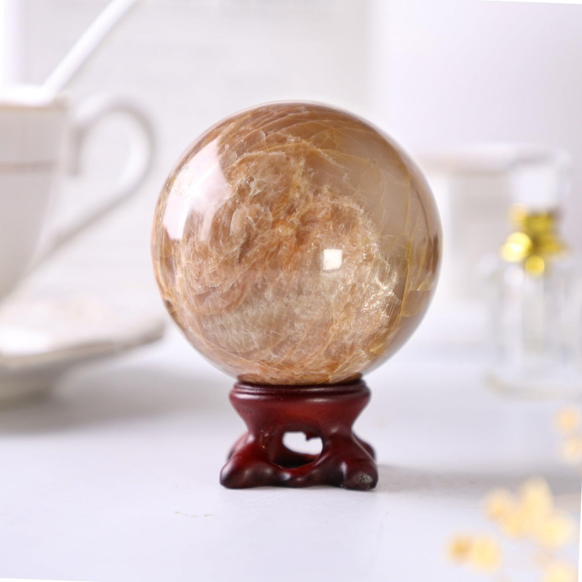 TUMBEELLUWA Orange Moonstone Crystal Ball with Stand for Fortune Teller Witchcraft Divination, Decorative Gemstone Sphere for Home Decor, 61-70 mm