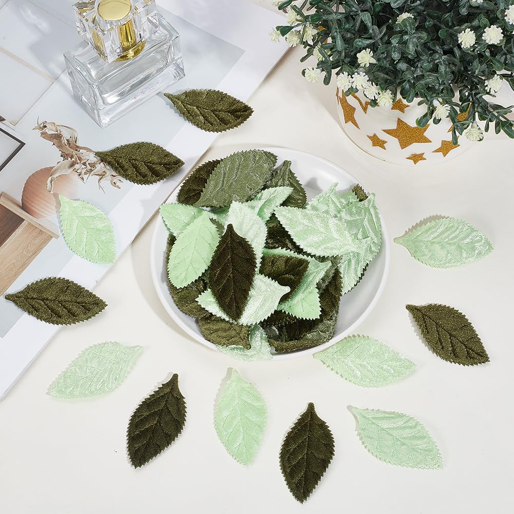 CABODYALS 100Pcs Mixed Green Velvet Fabric Leaves Spring Faux Artificial Craft Small Leaf Double Face Decorative Cloth Appliques Bulk for Sewing Making Wedding Party Scrapbooking Decor DIY Supply