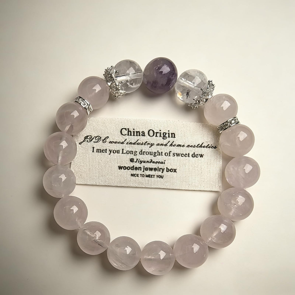 Natural crystal bracelet featuring 13mm beads and decorative charms, handcrafted and one-of-a-kind. This versatile, high-end stretchy bead bracelet for women is perfect for personal wear or as a gift. (Pink, Medium)