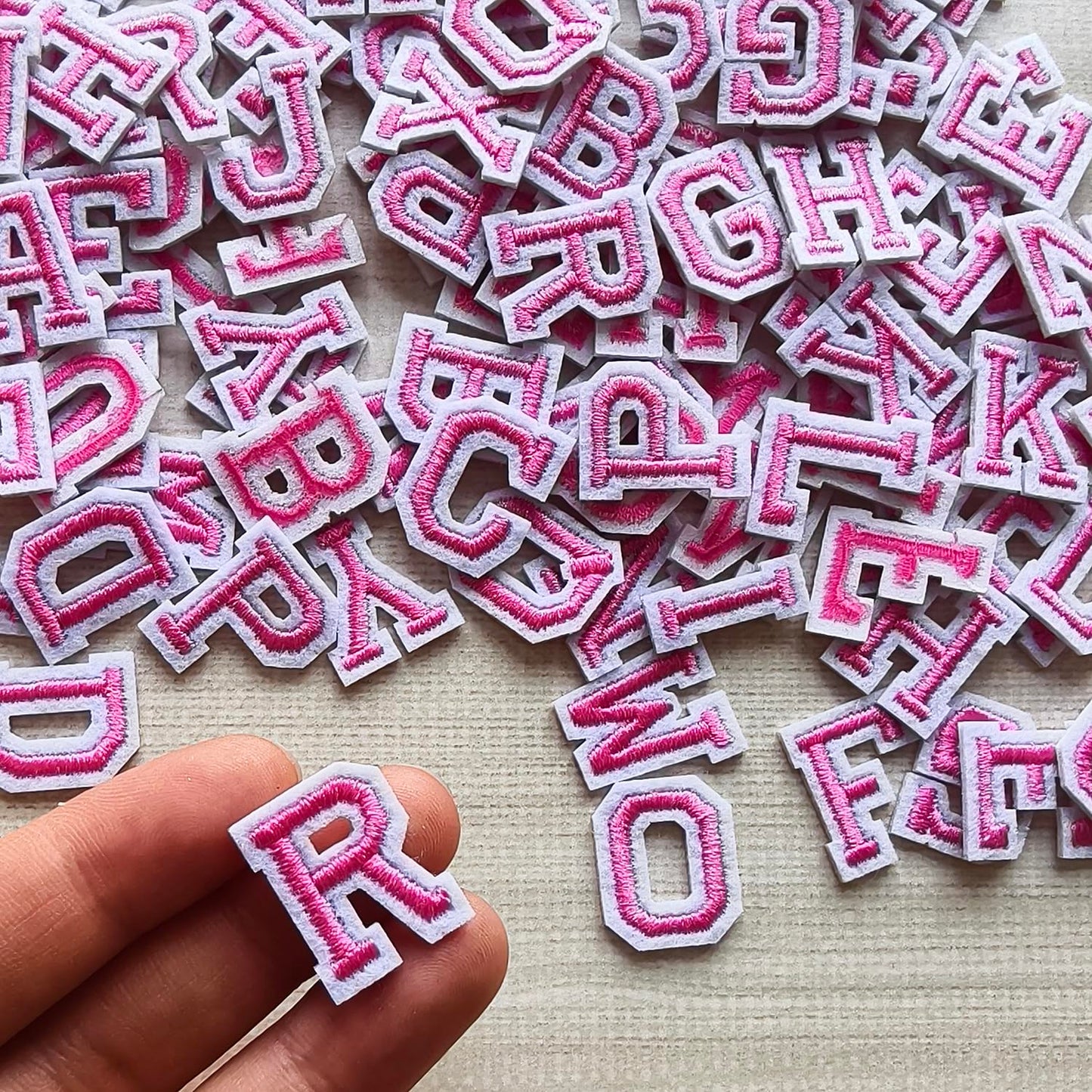 Zlettery 130pcs Iron on Letter Patches 0.7 inch, 5 Sets of 26 Embroidered Alphabet A-Z Patches for Clothing Jackets Hats Backpacks Jeans Pink