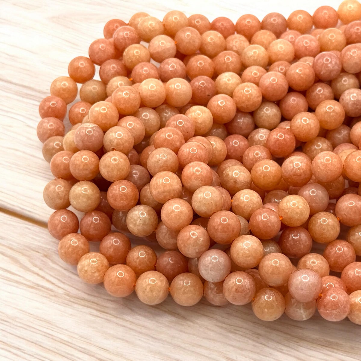 ABCGEMS Peruvian Strawberry Calcite Beads AKA Orchid Calcite (Well-Defined Peach & Orange Hues - Consistent Color with Minimal Fading or Dull Areas) Smooth Round 10mm