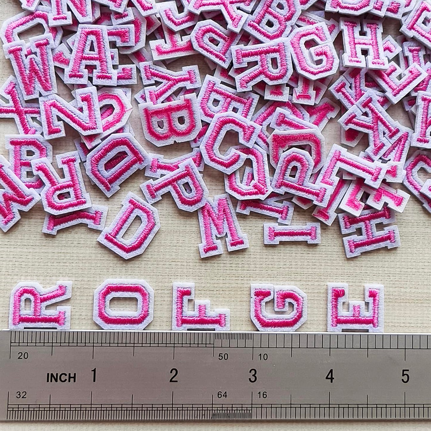 Zlettery 130pcs Iron on Letter Patches 0.7 inch, 5 Sets of 26 Embroidered Alphabet A-Z Patches for Clothing Jackets Hats Backpacks Jeans Pink