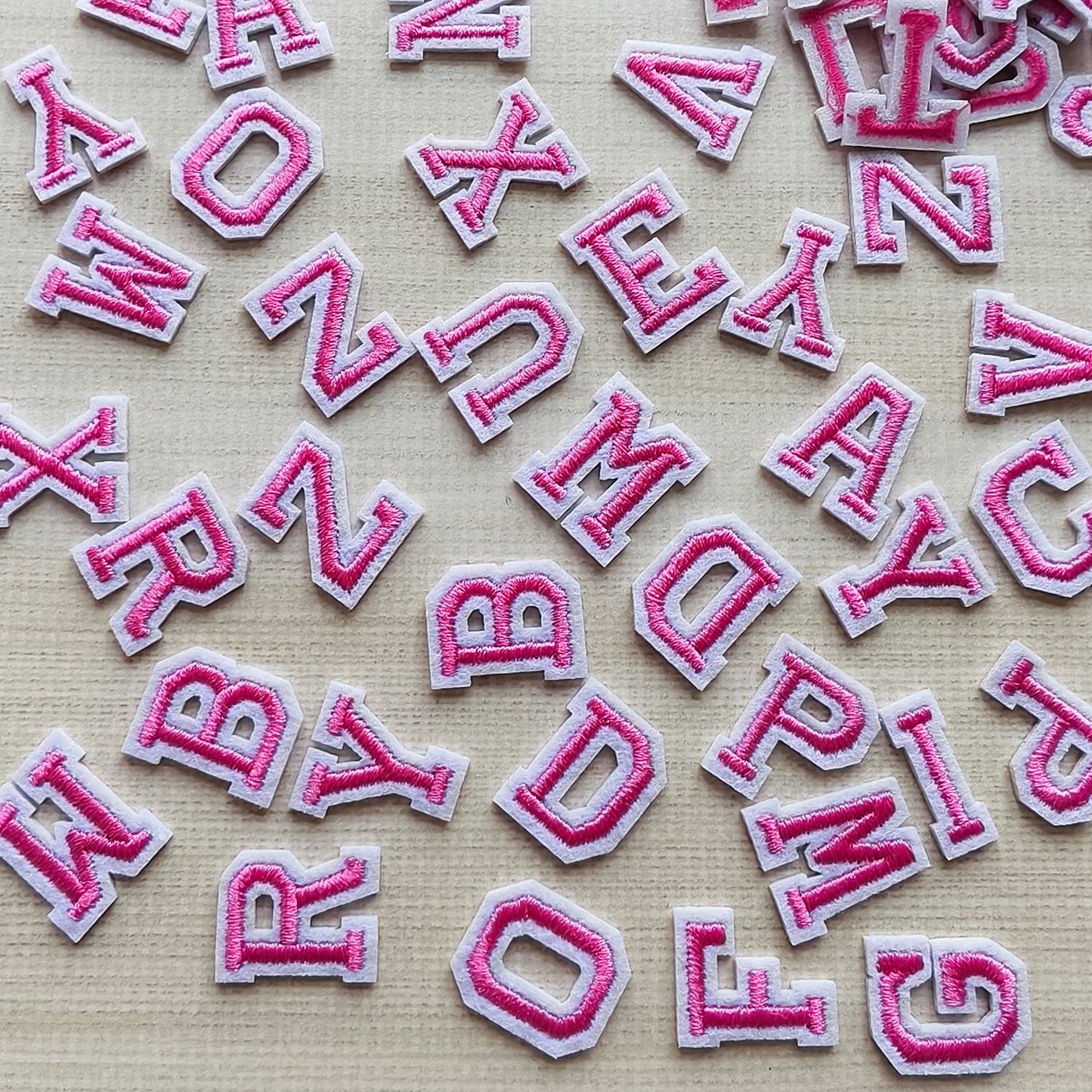 Zlettery 130pcs Iron on Letter Patches 0.7 inch, 5 Sets of 26 Embroidered Alphabet A-Z Patches for Clothing Jackets Hats Backpacks Jeans Pink