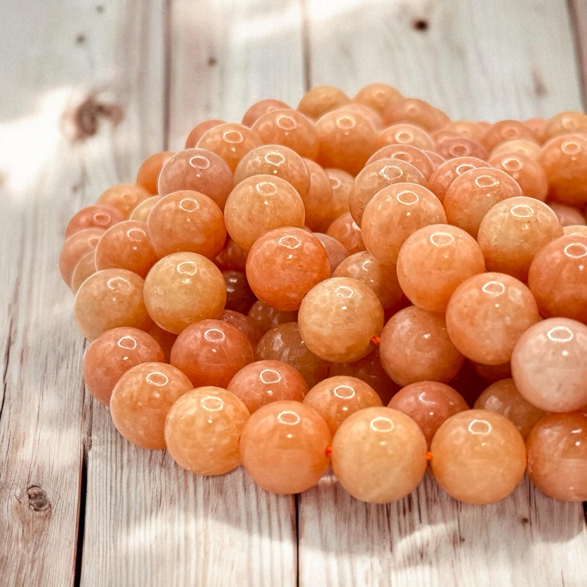ABCGEMS Peruvian Strawberry Calcite Beads AKA Orchid Calcite (Well-Defined Peach & Orange Hues - Consistent Color with Minimal Fading or Dull Areas) Smooth Round 10mm