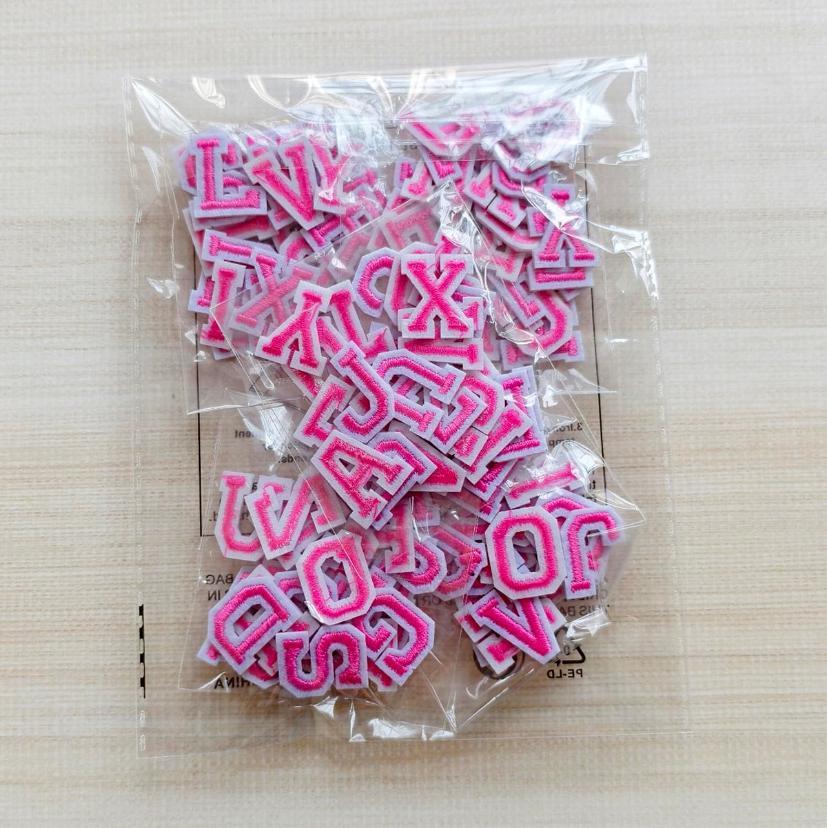 Zlettery 130pcs Iron on Letter Patches 0.7 inch, 5 Sets of 26 Embroidered Alphabet A-Z Patches for Clothing Jackets Hats Backpacks Jeans Pink