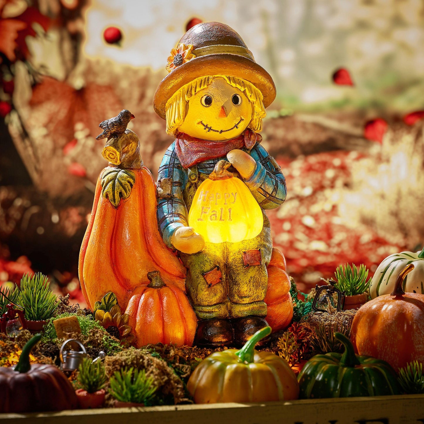 TERESA'S COLLECTIONS Fall Decor, Scarecrow Decor, Autumn Scarecrow Holding Pumpkin with Solar Lights, Waterproof Resin Outdoor Fall Decor, Fall Gifts Outdoor/Indoor,6.3"