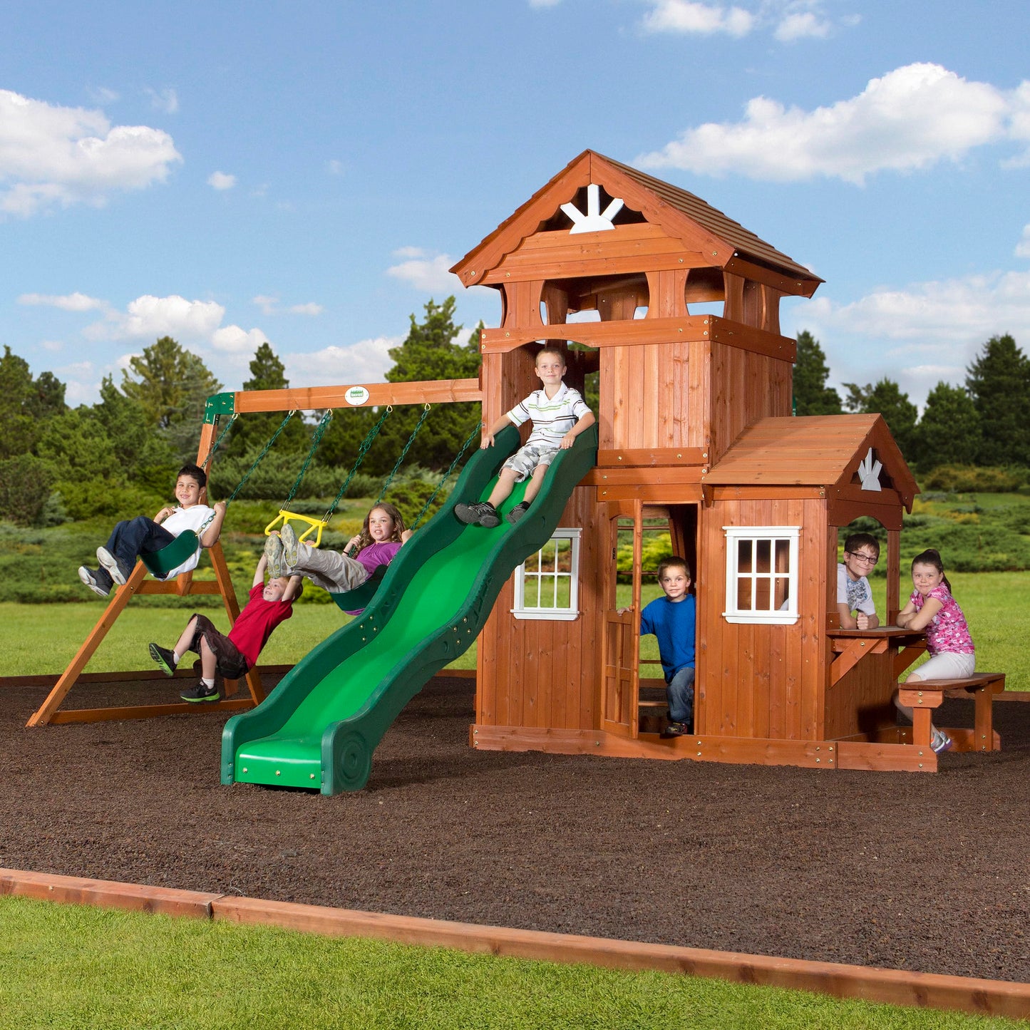 Backyard Discovery Shenandoah Cedar Wood Swing Set with Wave Slide, Raised Clubhouse, Playhouse, Play Kitchen, Belt Swings, Trapeze, Rock Wall, Ladder, Picnic Table, Full Door, Outdoor Playset